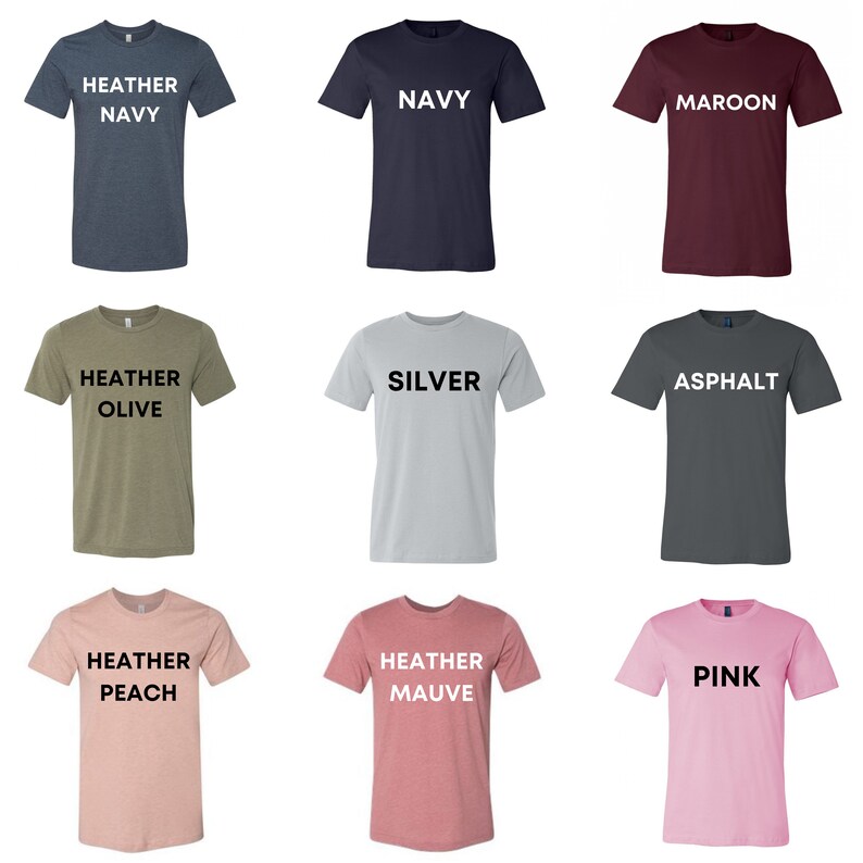 May include: Nine different solid-color t-shirts are displayed. Colors include heather navy, navy, maroon, heather olive, silver, asphalt, heather peach, heather mauve, and pink. Each shirt has the color name printed in white.