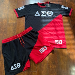 Delta-Signatur-Theta- besticktes kurzes Set.