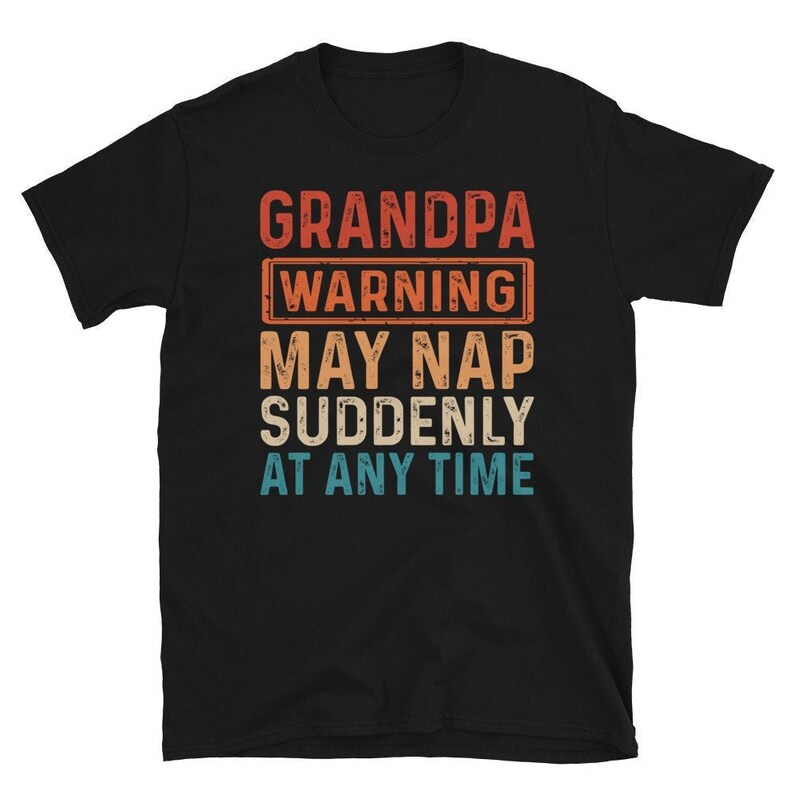 May include: Black t-shirt with a vintage-style graphic that reads "Grandpa Warning May Nap Suddenly At Any Time".