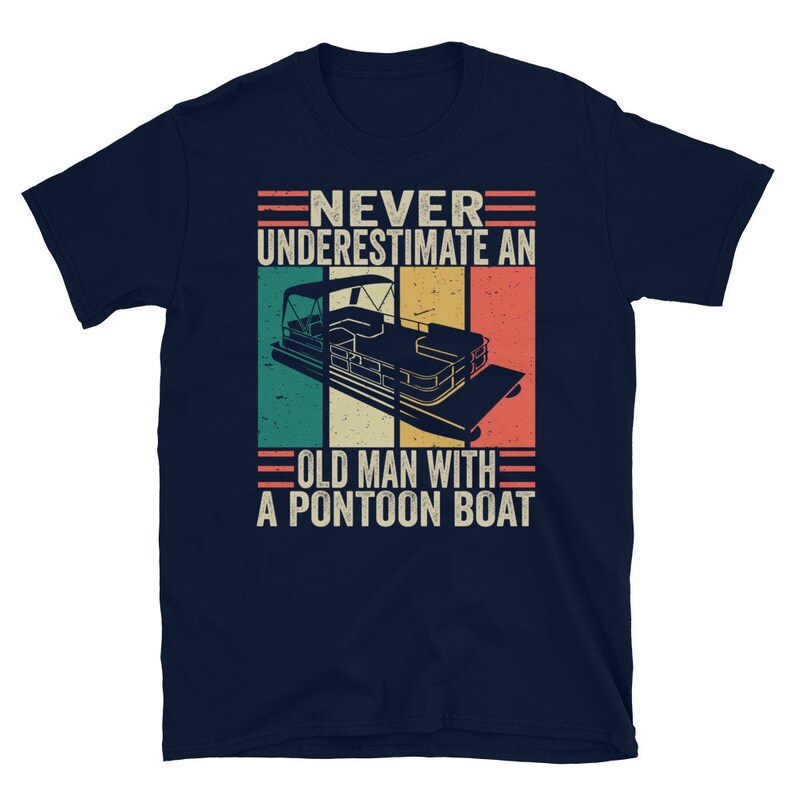 May include: Navy blue t-shirt with a vintage-style graphic of a pontoon boat and the text "Never underestimate an old man with a pontoon boat."