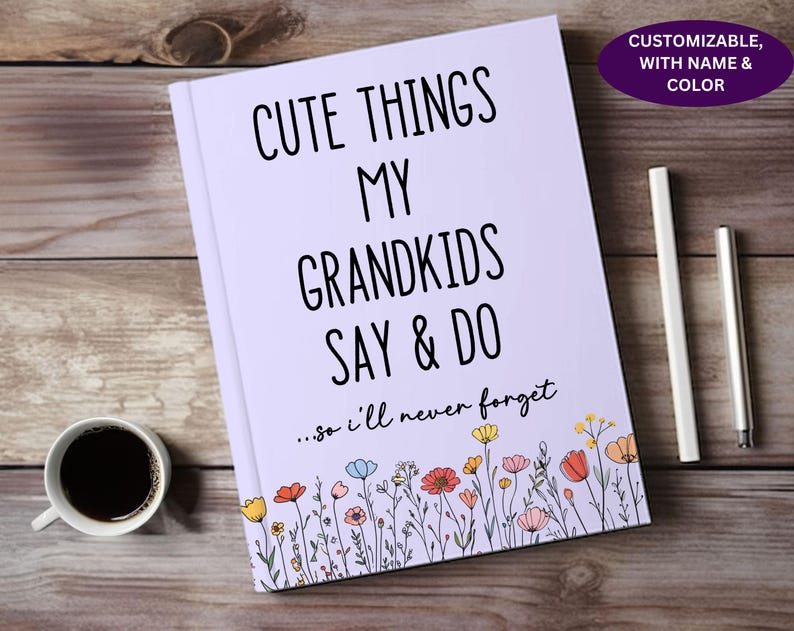 May include: A lavender journal with the text "Cute Things My Grandkids Say & Do...so I'll never forget" in black. The journal is decorated with a border of colorful flowers.