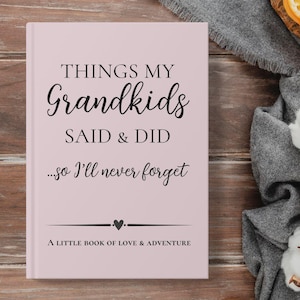 May include: A pink journal with the text "THINGS MY Grandkids SAID & DID ...so I'll never forget" and "A LITTLE BOOK OF LOVE & ADVENTURE".