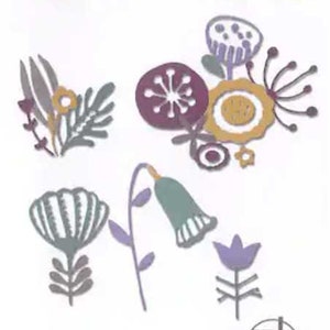 May include: A set of 22 die-cut floral designs in purple, green, and gold colors. The die cuts are called "Jennar" and are part of the Sizzix Thinlits line.
