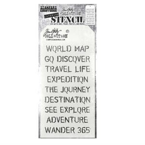 May include: A rectangular stencil with travel-themed words in a distressed font. The stencil includes phrases like "World Map," "Go Discover," "Travel Life," and "Adventure." The top of the stencil features the "Stampers Anonymous" and "Tim Holtz Collection" logos.