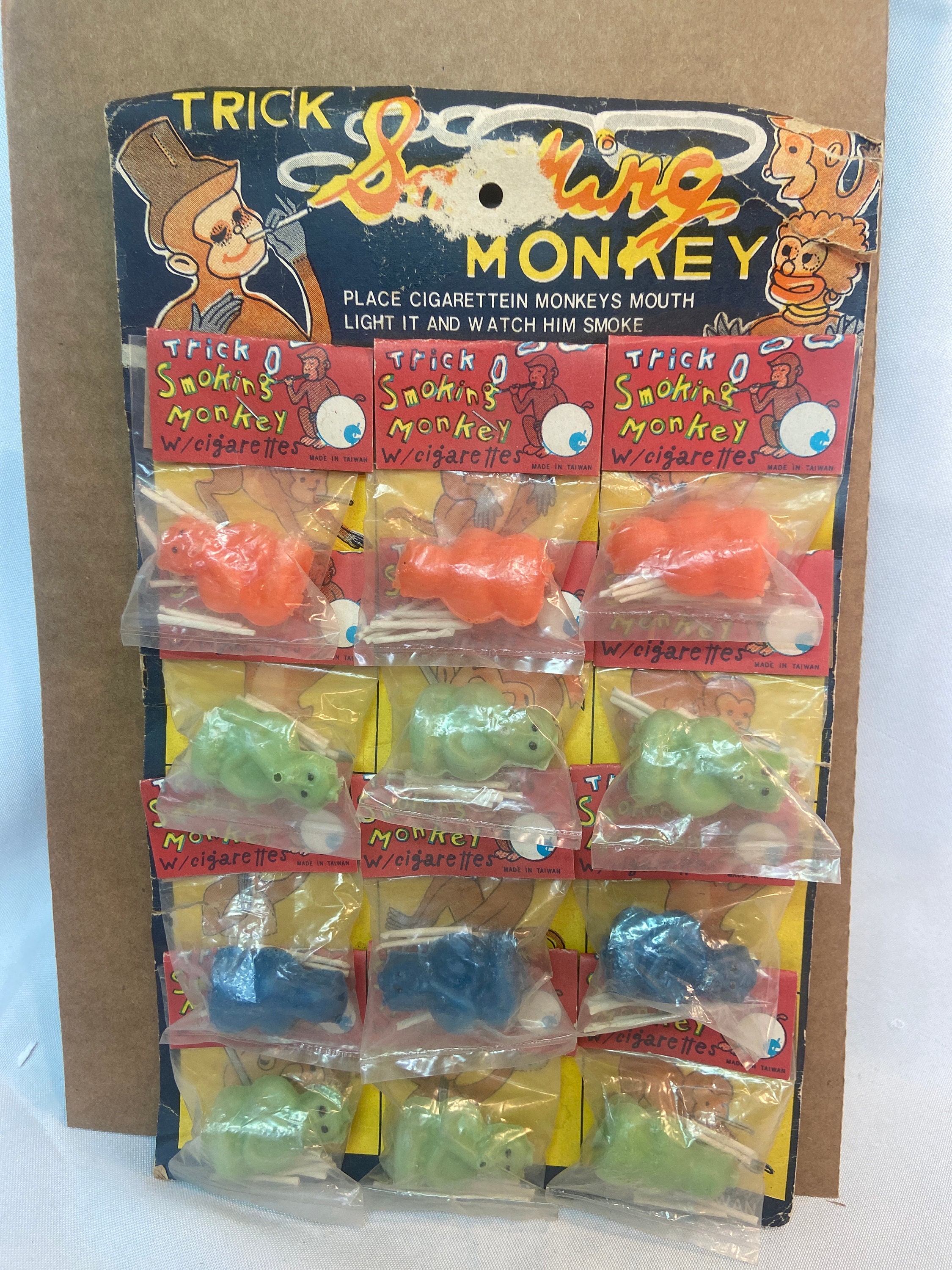 Vintage 1950's Novelty Trick Smoking Monkey Store Display W/ 12