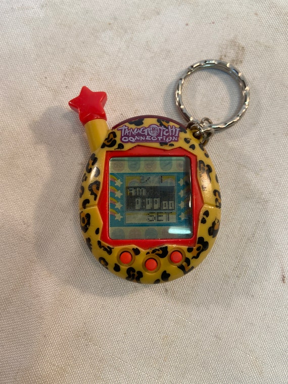 Tamagotchi Plus Connection Version 1 Yellow Cross bandai - Buy