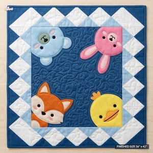 May include: A square quilt featuring a dark blue centre with swirling stitch patterns and four animal faces: a light blue bear, a pink rabbit, an orange fox, and a yellow duck. The border has white and blue triangles. Text reads: FINISHED SIZE 36" x 42".