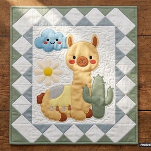 May include: A rectangular quilt featuring a central applique of a tan llama, a green cactus, a white daisy, and a blue smiling cloud. The border consists of white and sage green triangles. The finished size is printed as 36 inches by 42 inches.