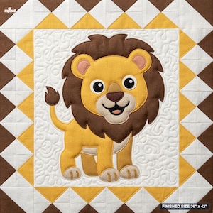 May include: A quilt featuring a central applique of a cartoon lion with a brown mane and yellow body on a white background with swirling stitching. The border consists of a geometric pattern of white, yellow, and brown triangles. Text reads 36" x 42".