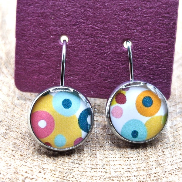 12mm diameter resin earrings on print, asymmetrical pattern, handmade