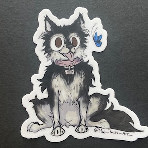 malamute husky with a butterfly sticker