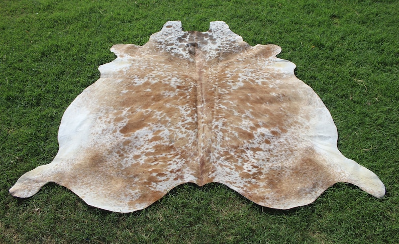 Matta i äkta kohud Brun och vit kohud Brasiliansk kohud Salt- och pepparmatta Kohud med hår på huden Spräcklig kohud bild 1