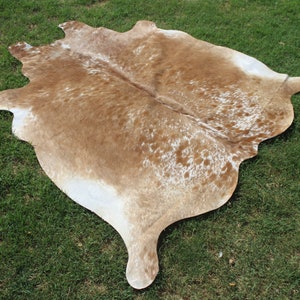 Matta i äkta kohud Brun och vit kohud Brasiliansk kohud Salt- och pepparmatta Kohud med hår på huden Spräcklig kohud bild 2