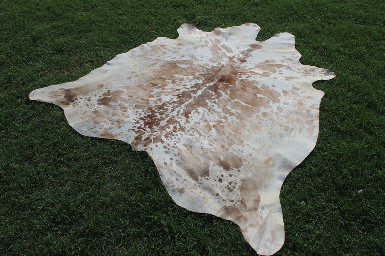 Matta i äkta kohud Brun och vit kohud Brasiliansk kohud Salt- och pepparmatta Kohud med hår på huden Spräcklig kohud bild 7