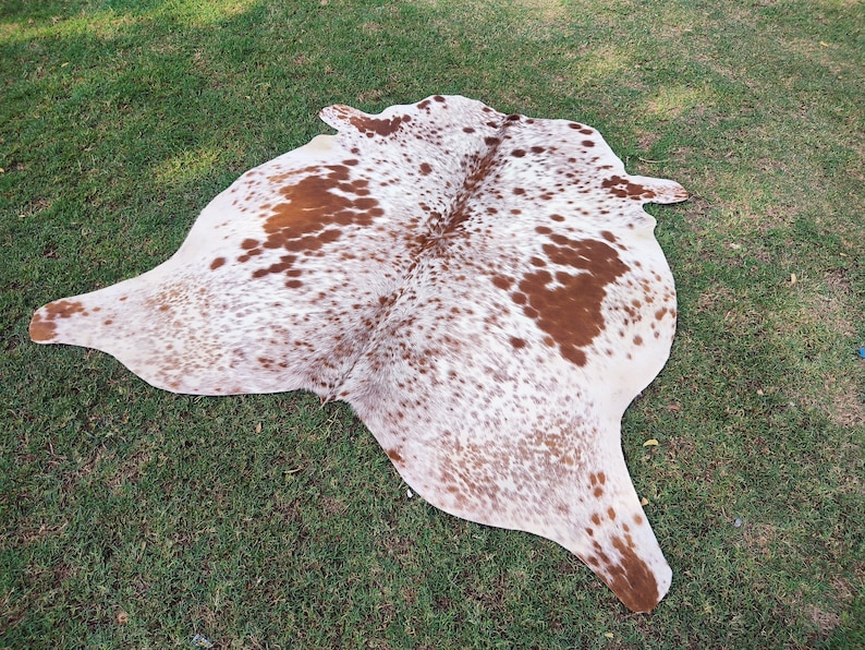 Matta i äkta kohud Brun och vit kohud Brasiliansk kohud Salt- och pepparmatta Kohud med hår på huden Spräcklig kohud bild 8