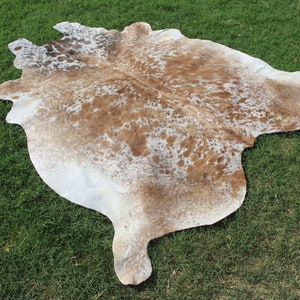 Matta i äkta kohud Brun och vit kohud Brasiliansk kohud Salt- och pepparmatta Kohud med hår på huden Spräcklig kohud bild 3