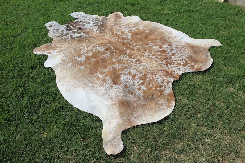 Matta i äkta kohud Brun och vit kohud Brasiliansk kohud Salt- och pepparmatta Kohud med hår på huden Spräcklig kohud bild 3