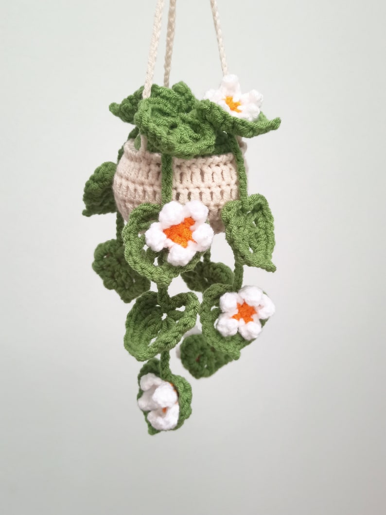 PATTERN: Step-by-step instructions for crocheting a Monstera leaf hanging planter with daisy flower, cute car rear view mirror, home decor image 4