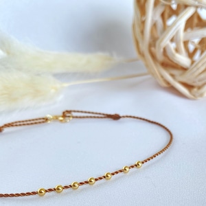 14k gold adjustable beige string bracelet - silk cord Kabbalah - solid gold bead - 14k gold spring clasp - birthday gift
