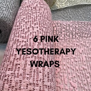K&ouml;nnte beinhalten: Sechs rosa Yeso-Therapie-Wickel, eine Art von Naturfasermaterial, das f&uuml;r K&ouml;rperwickel verwendet wird.