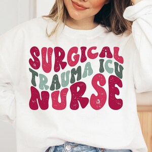Christmas Surgical Trauma Intensive Care Unit Nurse Crewneck Sweatshirt, Surgical Trauma ICU Sweater, STICU nurse Gift, holiday STICU Shirt