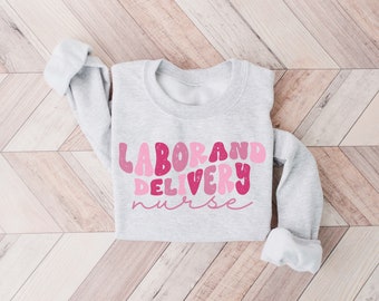 Labor and Delivery Nurse Sweatshirt, L&D Nurse Shirt, Labor And Delivery Nurse Sweatshirt, RN Gift, Nursing School Grad, LD Nurse Crewneck