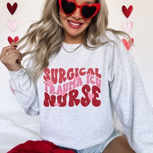 Valentines Surgical Trauma Intensive Care Unit Nurse Crewneck Sweatshirt, Surgical Trauma ICU Sweater, Gift for STICU nurse, STICU team gift