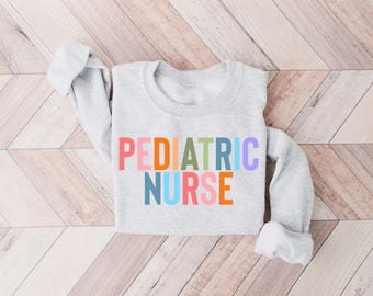 Rainbow Pediatric Nurse Sweatshirt, Cute Peds Nurse Shirt, Peds Nurse Crewneck, Pediatric Nurse Practitioner, Gift for Peds Nurse,PICU Nurse