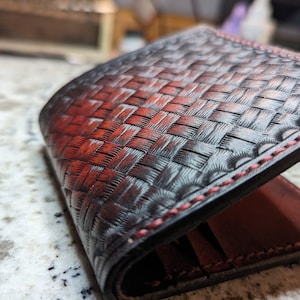 Cartera plegable de piel