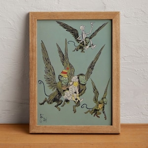 May include: A framed illustration of a scene from the Wizard of Oz. The Tin Man is flying on a winged monkey, while Dorothy and two other monkeys fly below. The illustration is on a light blue background with a wooden frame.