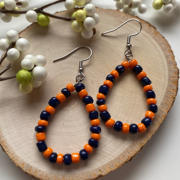 Orange and navy blue glass bead earrings