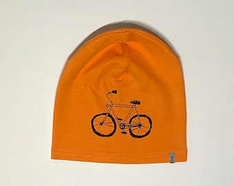 Cycling print kids beanie hat silkscreened, orange M/50, organic cotton