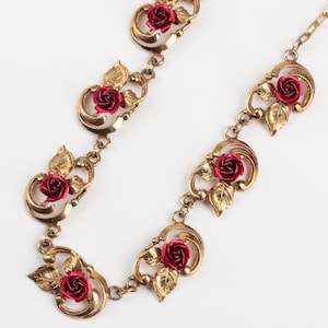Vintage floral rose necklace, 1950s style brass chain with red resin roses and leaf links, romantic botanical statement jewelry