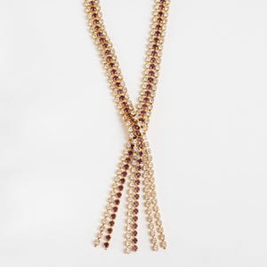 Vintage 1980s gold tone crystal y necklace with purple and clear rhinestones, statement layered tassel drop necklace for women