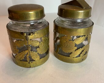 Vintage brass and glass canisters