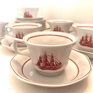 Wedgwood Flying Cloud Georgetown Collection mixed set of plates and cups rust color