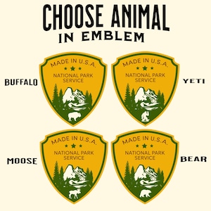 May include: Four yellow and green National Park Service emblems with different animal illustrations: buffalo, yeti, moose, and bear. The text "CHOOSE ANIMAL IN EMBLEM" is at the top. Each emblem reads "MADE IN U.S.A." and "NATIONAL PARK SERVICE."