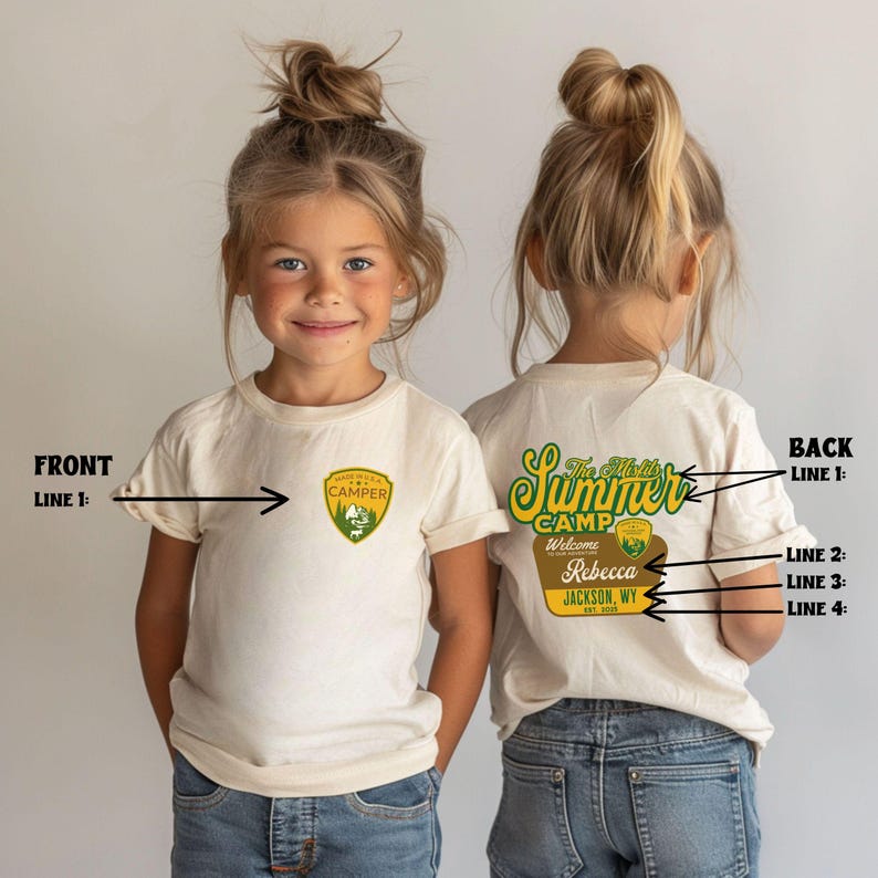 May include: A cream-colored t-shirt with a small emblem on the front that says "Made in U.S.A. Camper". The back of the shirt has "The Misfits Summer Camp" in green and yellow, with "Welcome Rebecca JACKSON, WY" below.