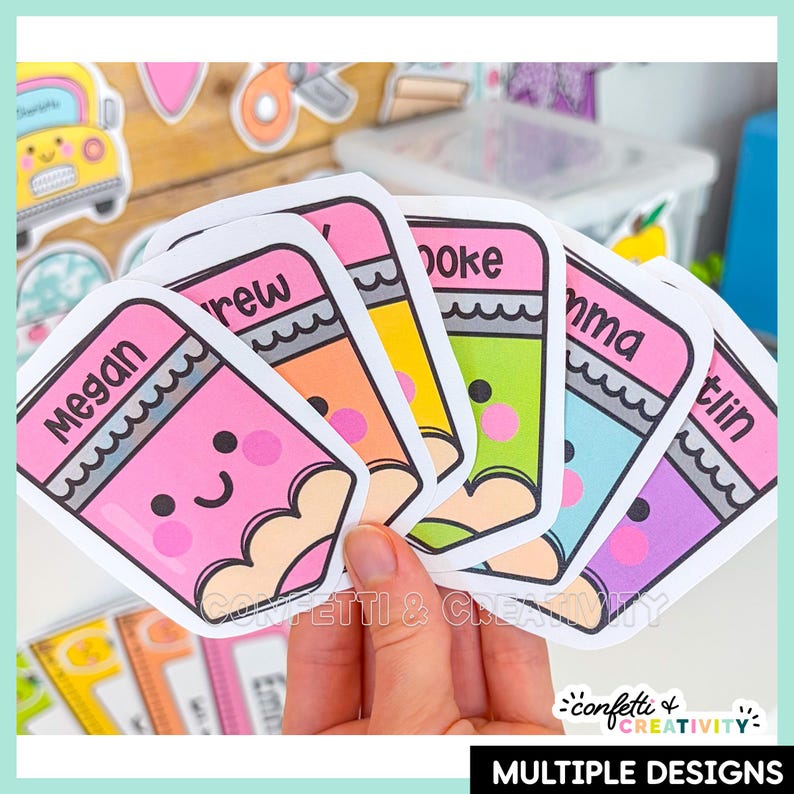 May include: A set of die-cut stickers shaped like cartoon pencils with smiling faces, each featuring a different pastel color and a personalized name printed in black text. The stickers are arranged in a fan shape, displaying various colors.