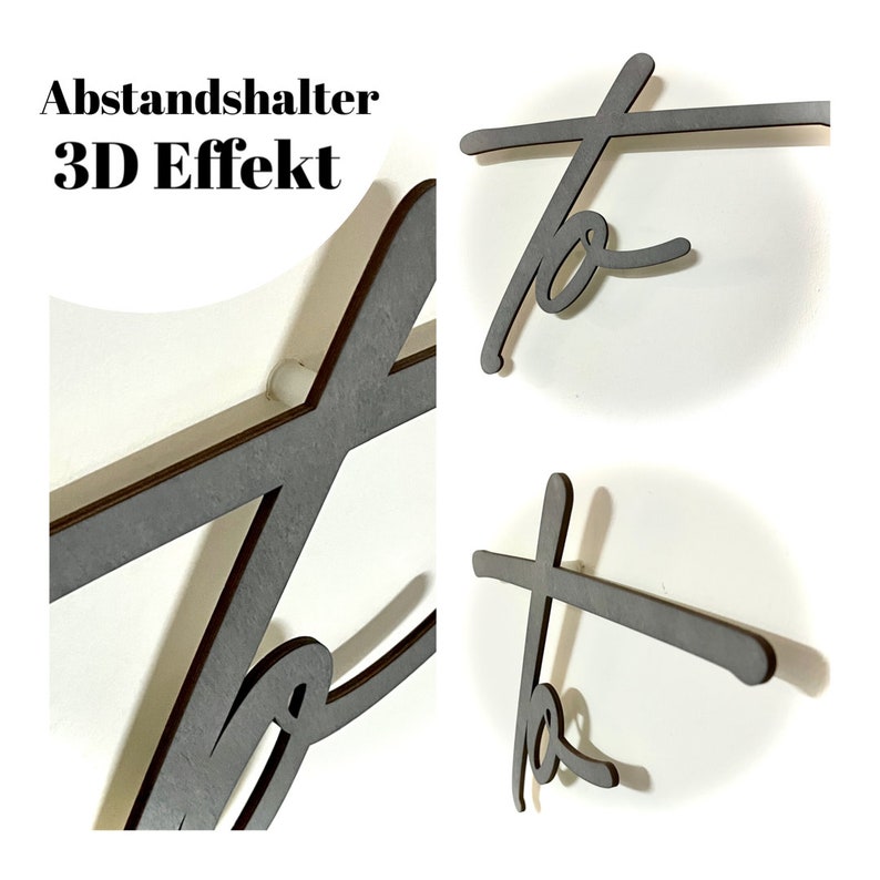 May include: A close-up of a wooden "to" sign with a 3D effect. The sign is made of two pieces of wood that are layered on top of each other. The text "Abstandshalter 3D Effekt" is visible in the top left corner of the image.