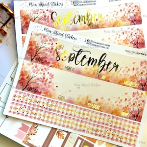 May include: Three planner stickers with a watercolor fall theme. The stickers feature a tree with red and orange leaves, a gold glitter background, and the word "September" in gold script. The stickers also include days of the week and a gingham pattern.