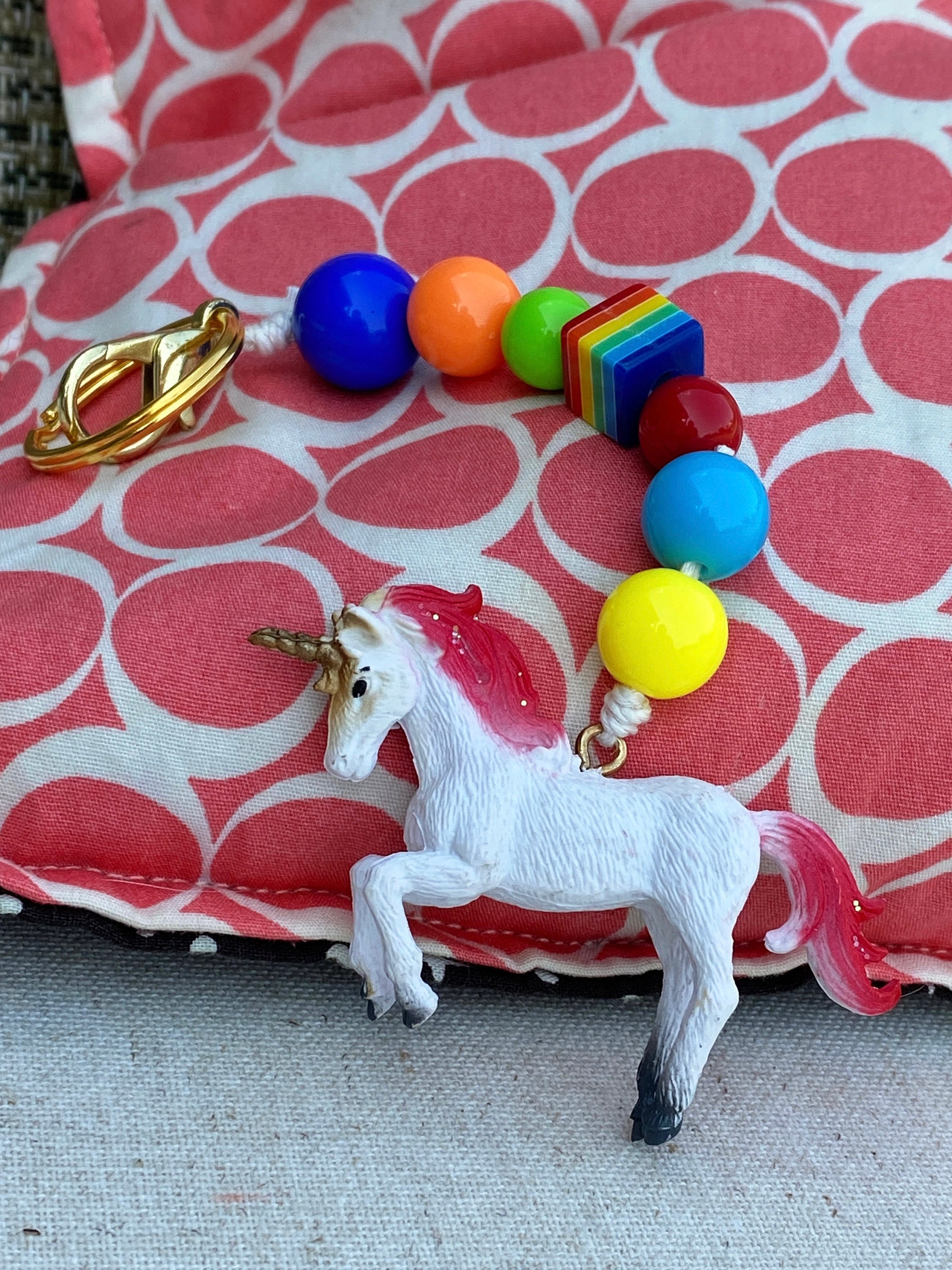 Unicorn shop backpack keychain
