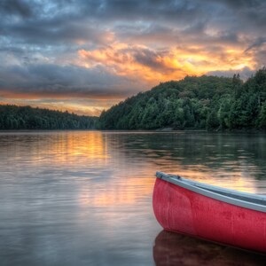 Red Canoe at Sunset with Storm Clouds - Algonquin Provincial Park, Ontario, Canada (Digital Print)