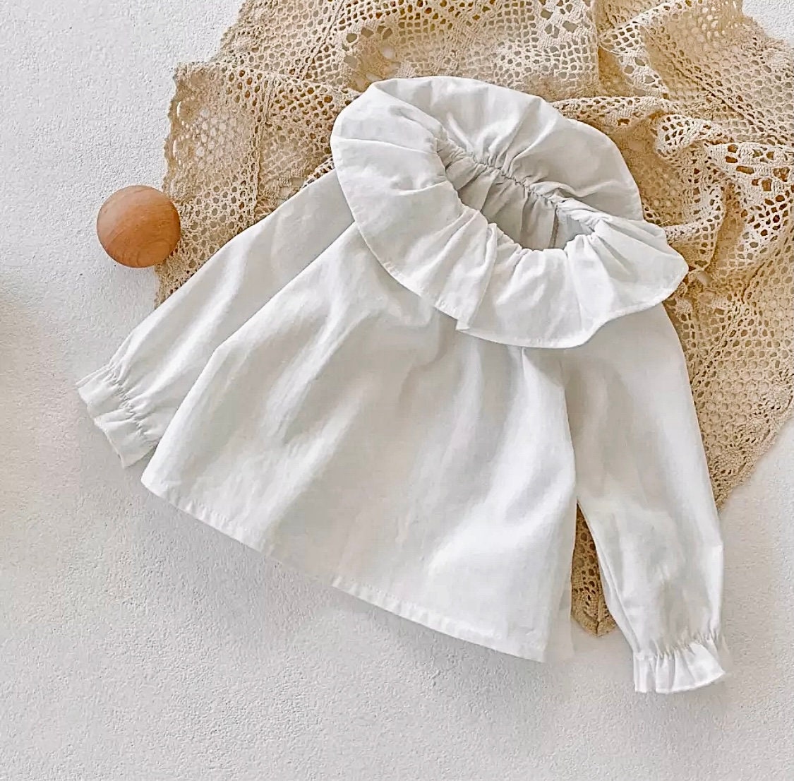 little girl white ruffle blouse