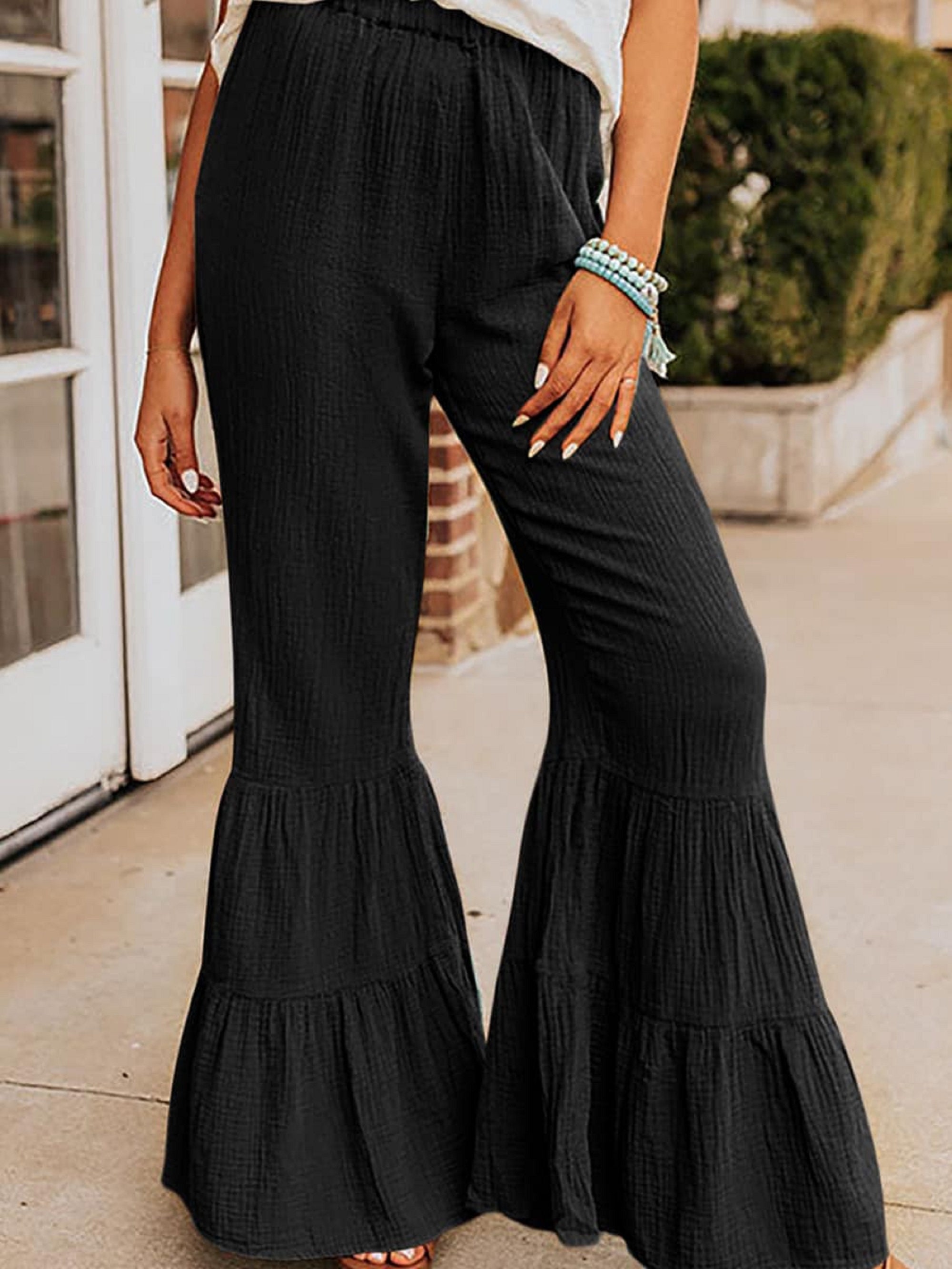 Trending: How to wear black bell bottom flares | Black bell bottoms outfit, Black  bell bottoms, Bell bottoms outfit