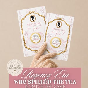 May include: Two rectangular game cards featuring a gold ornate frame, a black silhouette profile, and a pink teacup illustration. The text reads Who Spilled the Tea? and includes a gold circular scratch-off area with the text Winner inside.