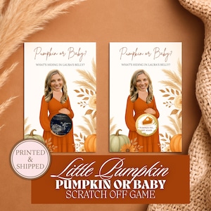May include: Two rectangular cards with the text "Pumpkin or Baby?" and "What's hiding in Laura's belly?" are displayed. The cards feature a woman in an orange dress holding a circle with an image. The bottom of the image has the text "Little Pumpkin Pumpkin or Baby Scratch Off Game".