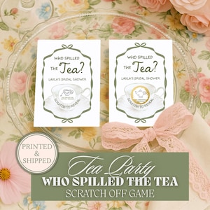May include: Two white cards with the text "Who Spilled the Tea?" for a bridal shower, featuring a teacup illustration and a scratch-off area. A pink bow and the text "Tea Party Who Spilled the Tea Scratch Off Game" are also visible.