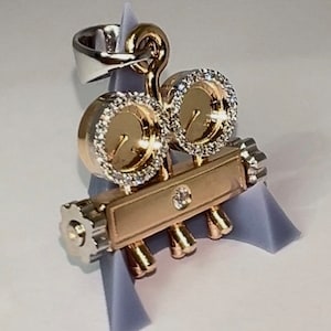 Custom handmade 14k yellow & white gold, natural diamond refrigerant manifold gauge. Also available in silver with moissanite