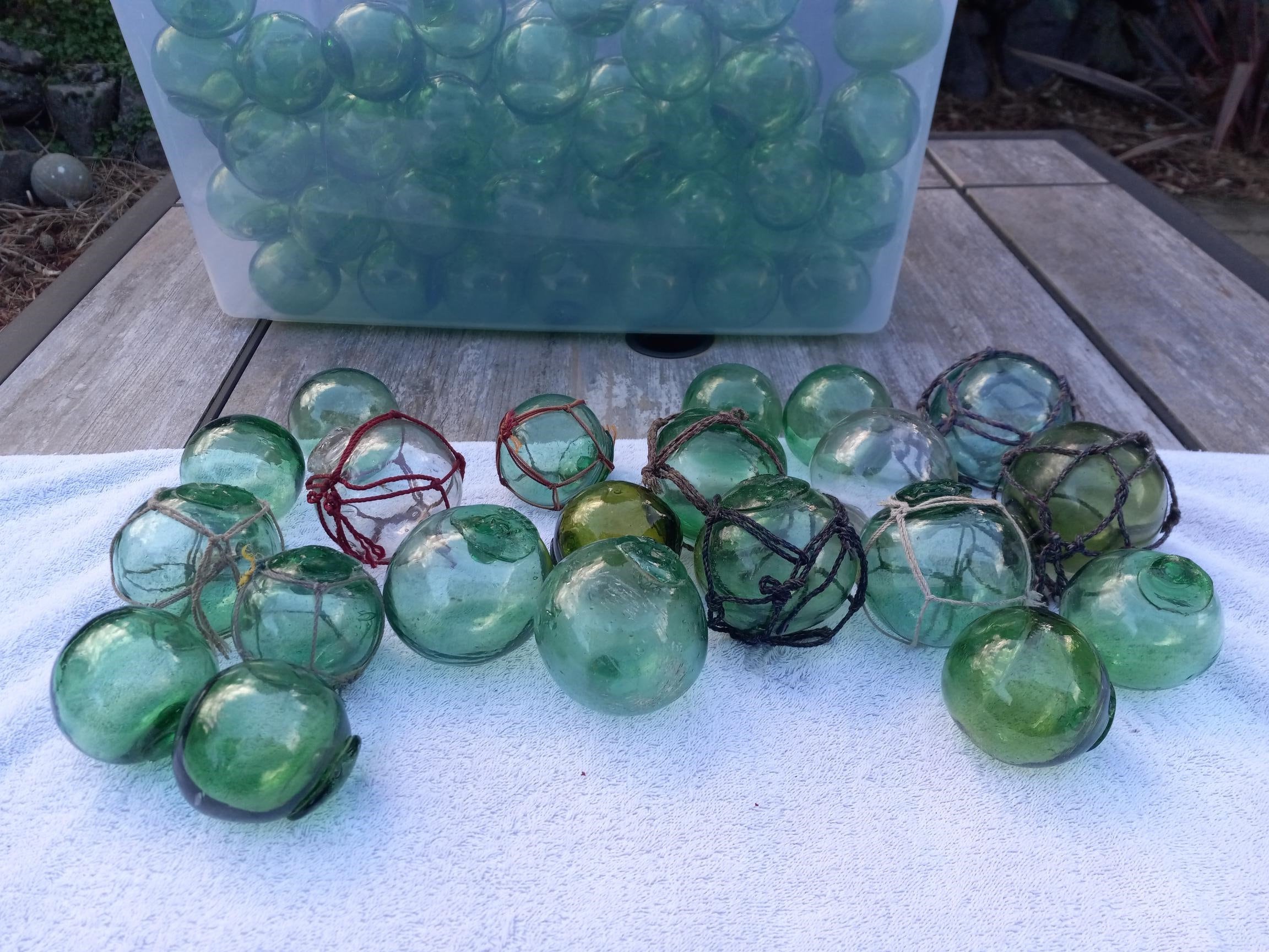 Authentic vintage Japanese glass fishing floats $30 each 4 inch diameter  Available in shades of aqua-blue and green Mix and match your f